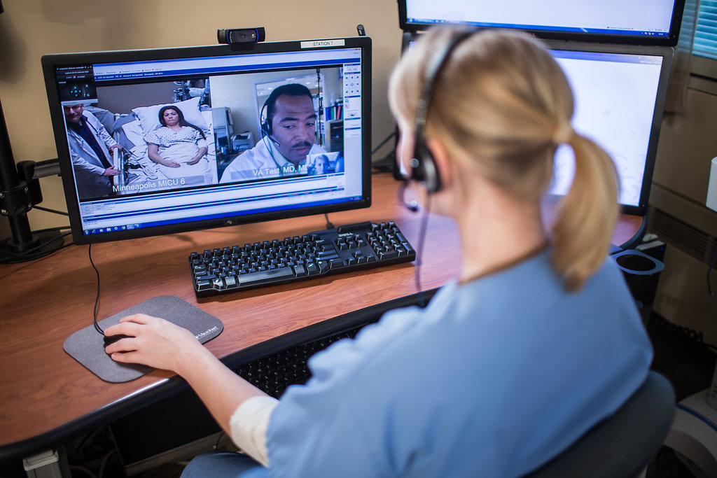 Clinician, nurse, and patient on video call.